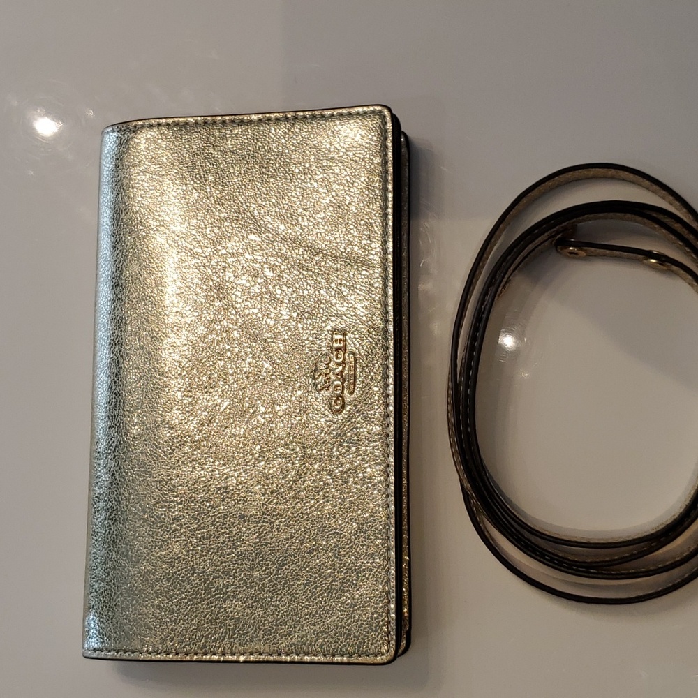 Coach gold clutch